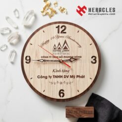 Mẫu đồng hồ gỗ treo tường in logo Eastern Lumber làm quà tặng kỷ niệm 16 năm thành lập doanh nghiệp sang trọng từ công ty TNHH DV Mỹ Phát kính tặng.