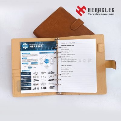 Dịch vụ in sổ tay quà tặng doanh nghiệp với thiết kế sổ da bìa còng dập logo nổi và các trang thông tin cá nhân chuyên nghiệp